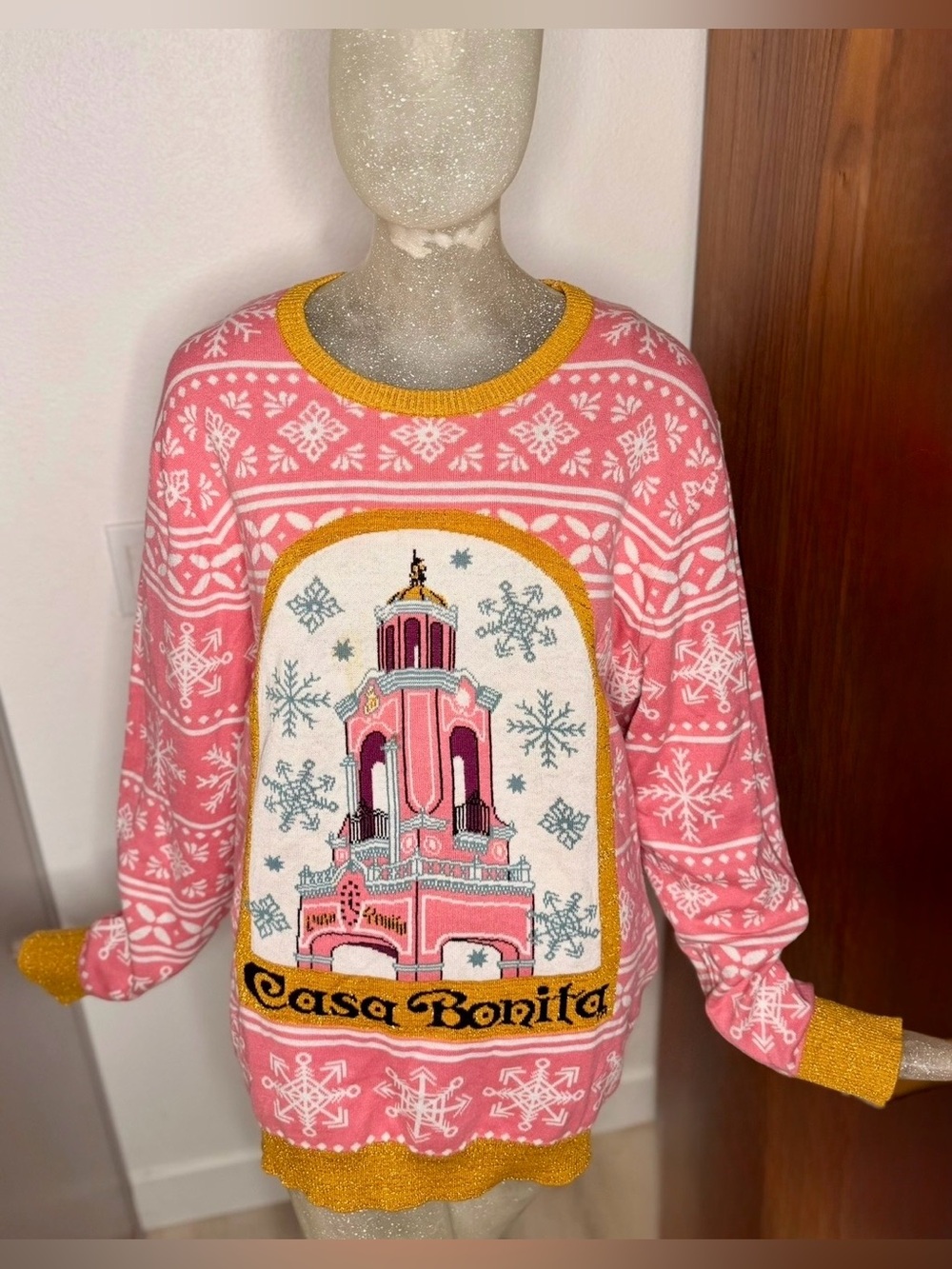 Casa Bonita Snowy Tower Ugly Christmas Sweater Pink Gold. Size XL